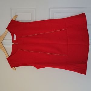 Calvin Klein red blouse with gold zipper details down front